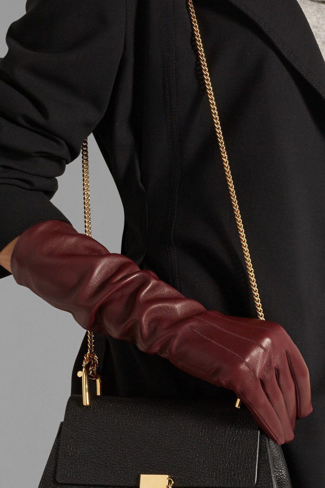 Burgundy leather opera gloves with black handbag gold chain